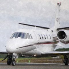 Pilatus landing and Cessna taxiing
