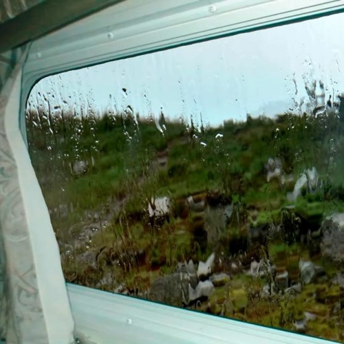 Rain Hitting Campervan Roof and Window