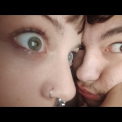 the girl with safety pins on her clothes