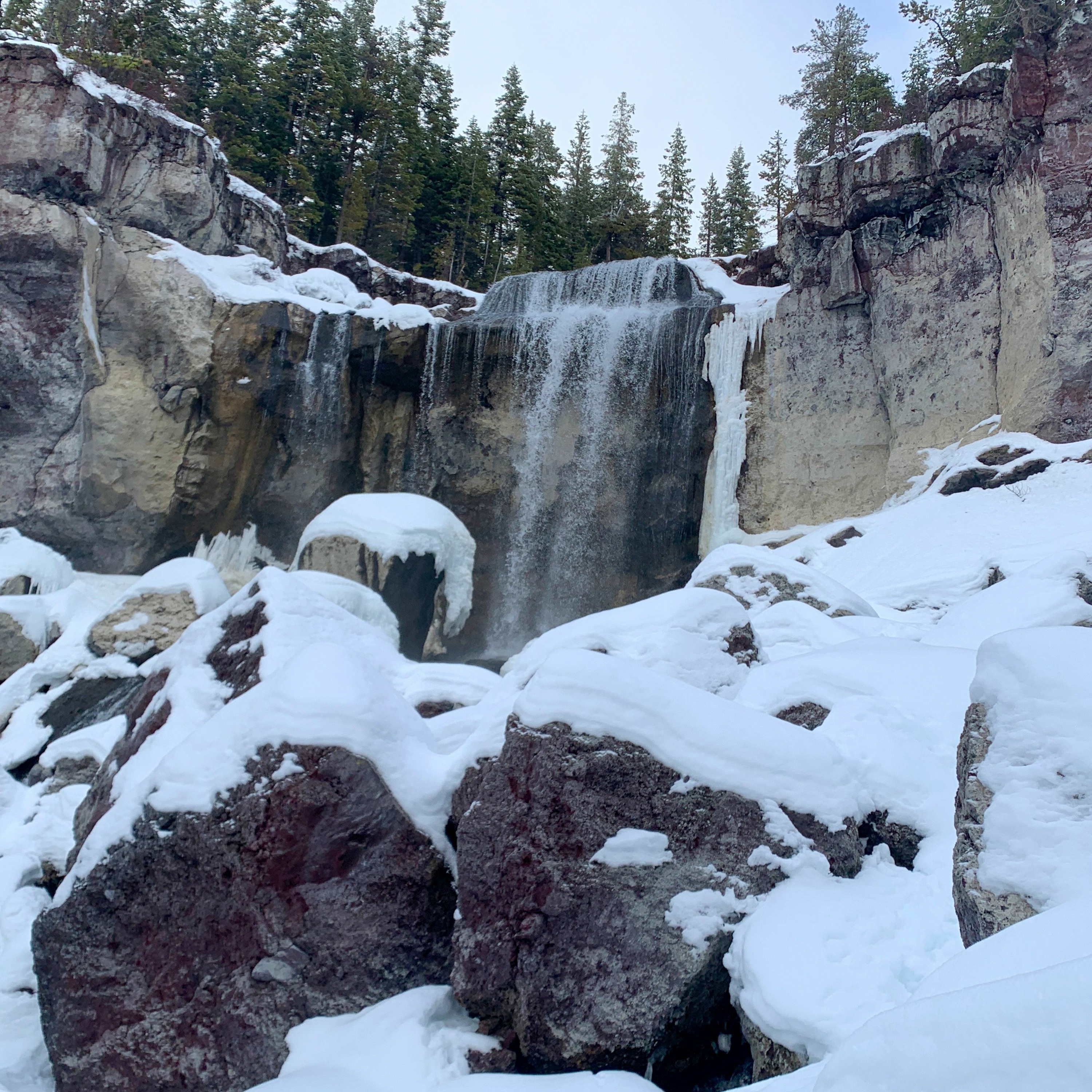 Ski or snowshoe to ice-covered waterfall, hot springs, lake, at Newberry Volcanic Monument