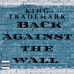 BACK AGAINST THE WALL