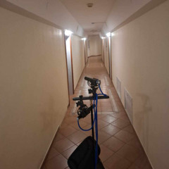 Quiet indoors - hotel elevator in corridor, clock ticking, buzzing libhtbulb