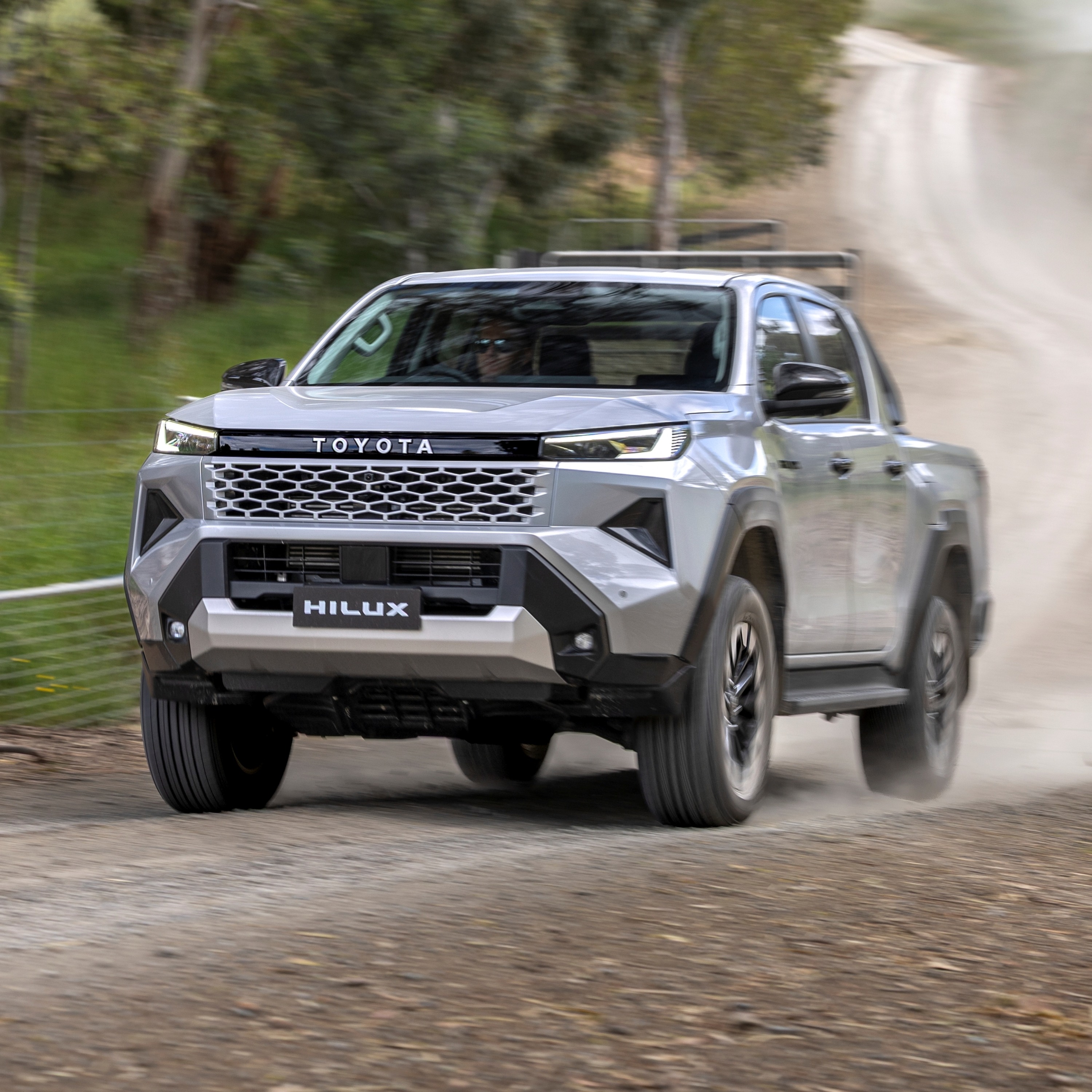 Road pricing, EV charging, showroom robots, HiLux