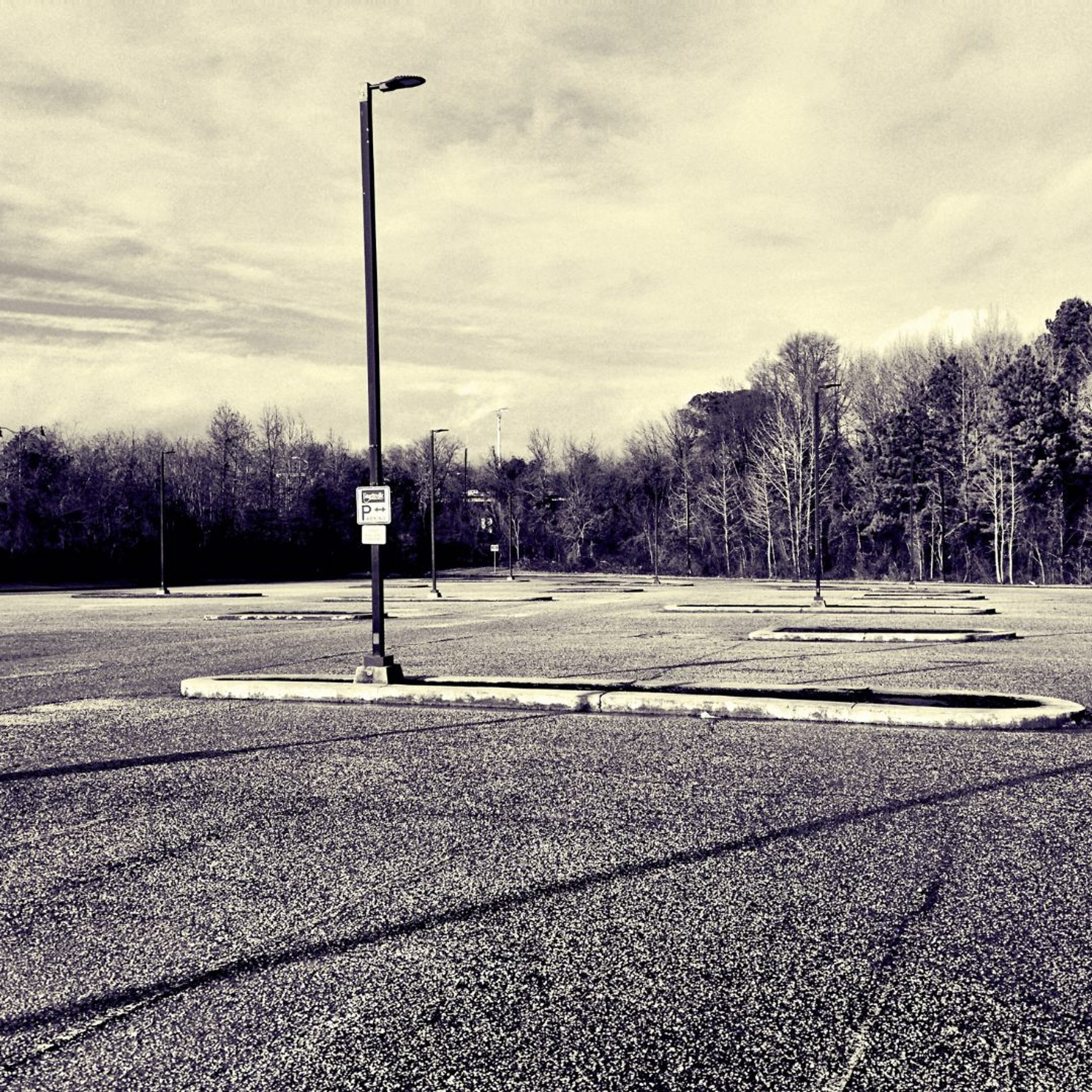 ”The Holiness of an Empty Walmart Parking Lot” by Mark Pratt-Russum