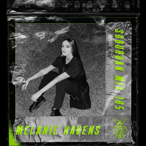 Suburban Mix 185 Melanie Havens. Dark cover, neon-green text, monochrome photo of the artist sitting on a dark meadow.