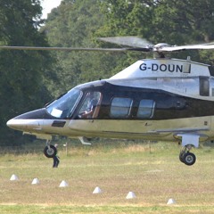 Agusta A109S Helicopter - hovering to land