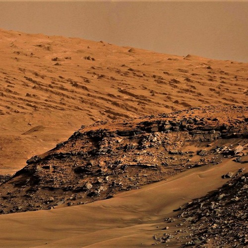 Mars expedition.  (red sands blown across the plains)