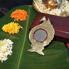 Timeless Beauty: The Peacock Aranmula Kannadi