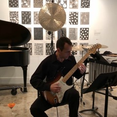 "…spaces to listen to from within (iii)" for electric guitar, transduced wind gong, and electronics