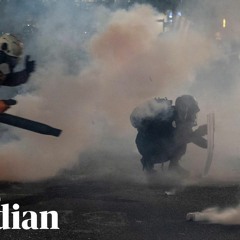 With Masks Upon Their Faces And Leaf-Blowers In Their Hands