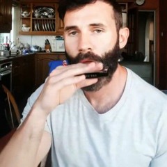 Guy beatboxing with harmonica