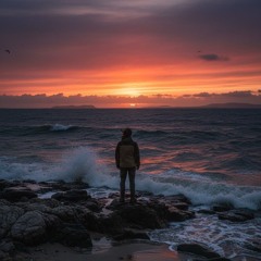 Standing by the ocean