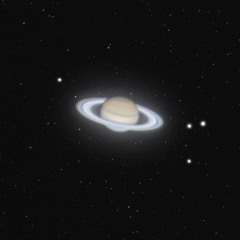 Celestial Void - A View of the Rings Of Saturn From a Capsule Hurtling Through Outer Space