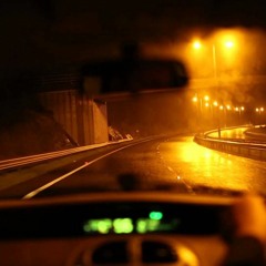 Behind the wheel.