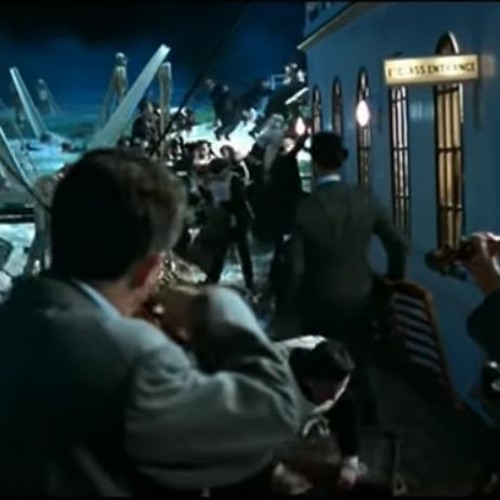 Why did the band play on as Titanic went down?