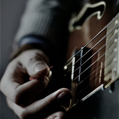 "While My Guitar Gently Weeps"