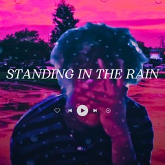 Standing in the rain