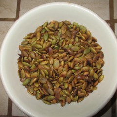 pumpkin seeds cooling after being toasted on a dry skillet