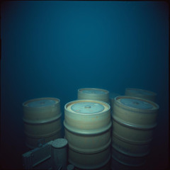 Behind the Barrels