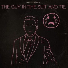 THE GUY IN THE SUIT AND TIE