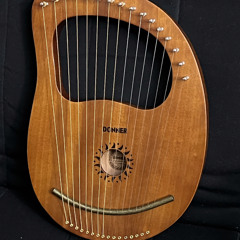 Donner 16 (metal) string lyre tuned to A=444 Hz with Key of David + 9 Solfeggio frequencies