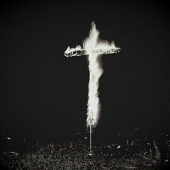 In my front yard burning the letter t
