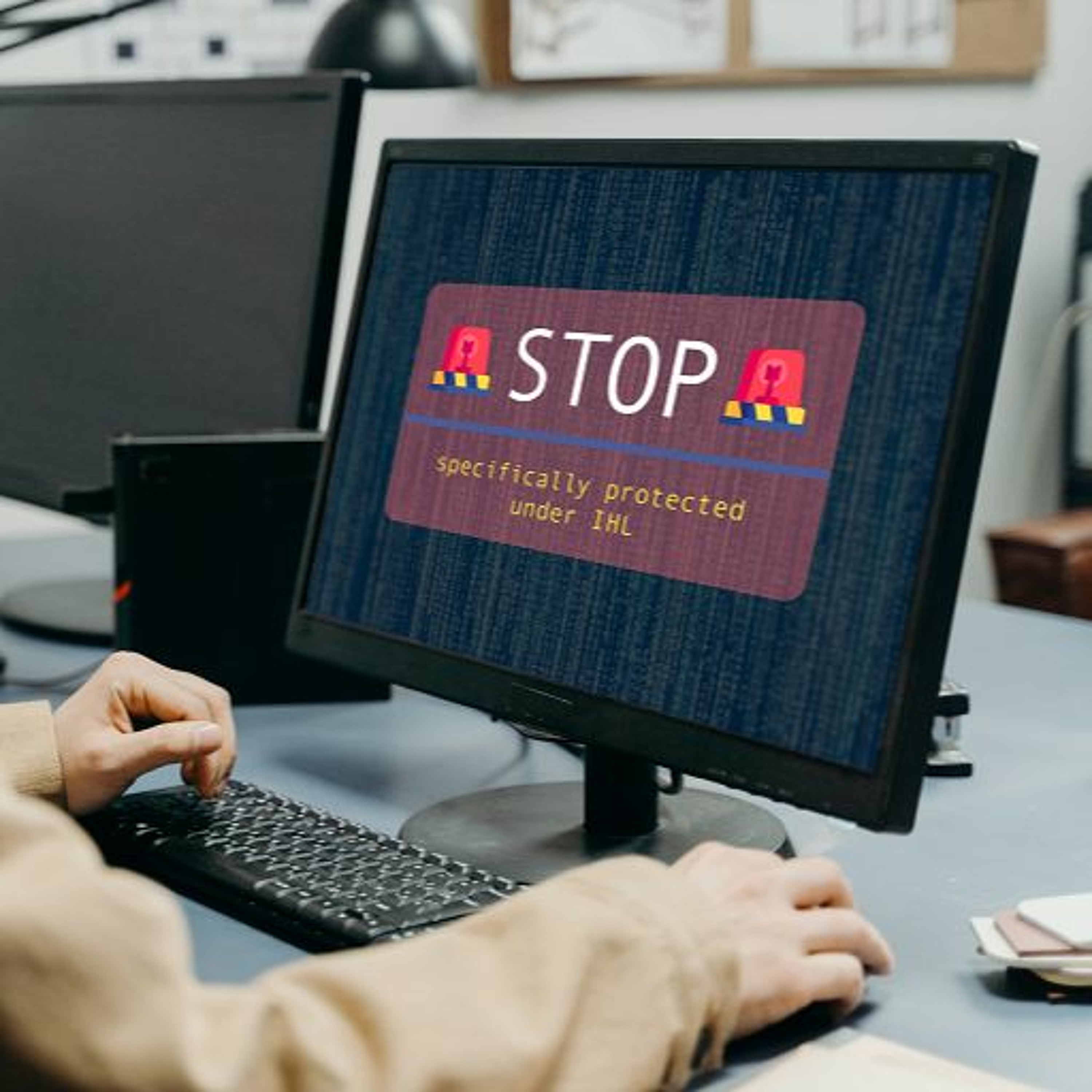 Signaling legal protection during cyber warfare: an authenticated digital emblem