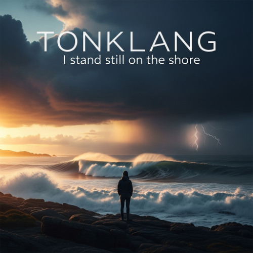 I stand still on the shore,