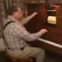 Guy playing a doohickey