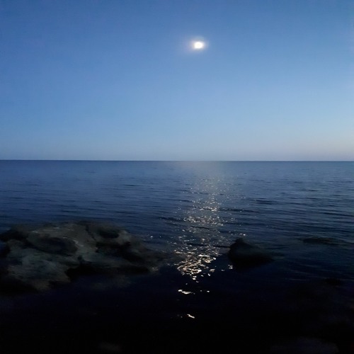 Moon Over The Sea