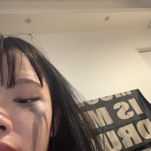 smelling flowers in the trash