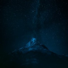 sitting on a mountain in the night thinking of the dark