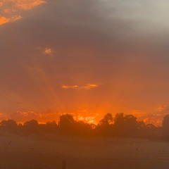 RaysofLightShiningThroughSwirlingCloudsOfDust