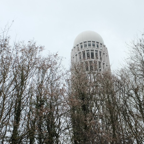 Live from the building on the left, behind the tall one with square windows