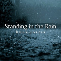 standing in the rain