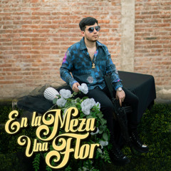 En la Meza una Flor
