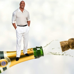 No hands dwayne uncorks a bottle of champagne