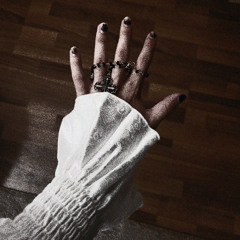 a distant glow piercing through the gloom, it's cold light burns me