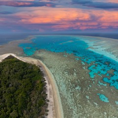 Waves breaking on coral beach, Great Barrier reef,  Australia