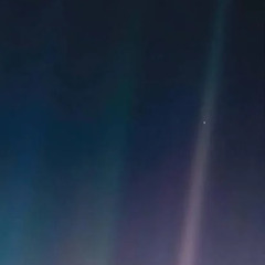 Look again at that dot. That's here. That's home. That's us.