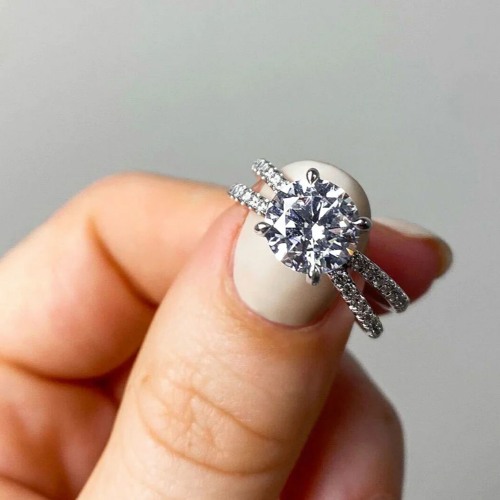 Stream The Pros Of High Set Vs. Low Set Engagement Rings by