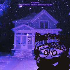 a snowy house besides a snowy hospital