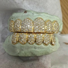 DIENTE ORO Y DIAMANTE