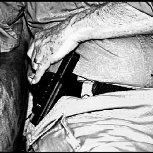 Black and white belt with gun and arm