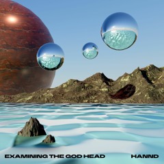 EXAMINING THE GOD HEAD W/ HANND