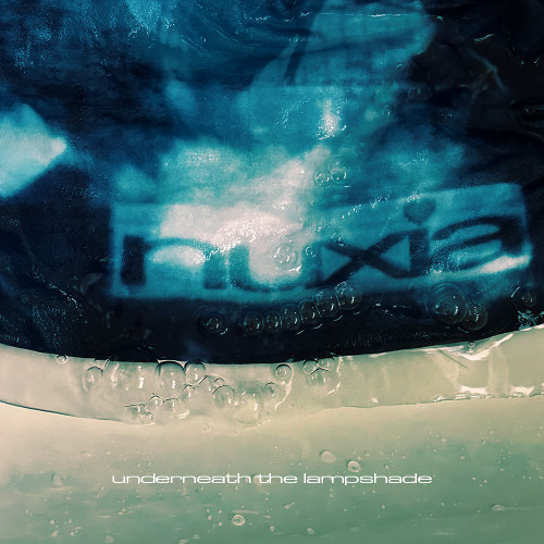 UNDERNEATH THE LAMPSHADE
