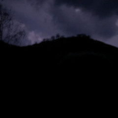Rolling thunder in Swiss mountains developing into heavy rain and wind