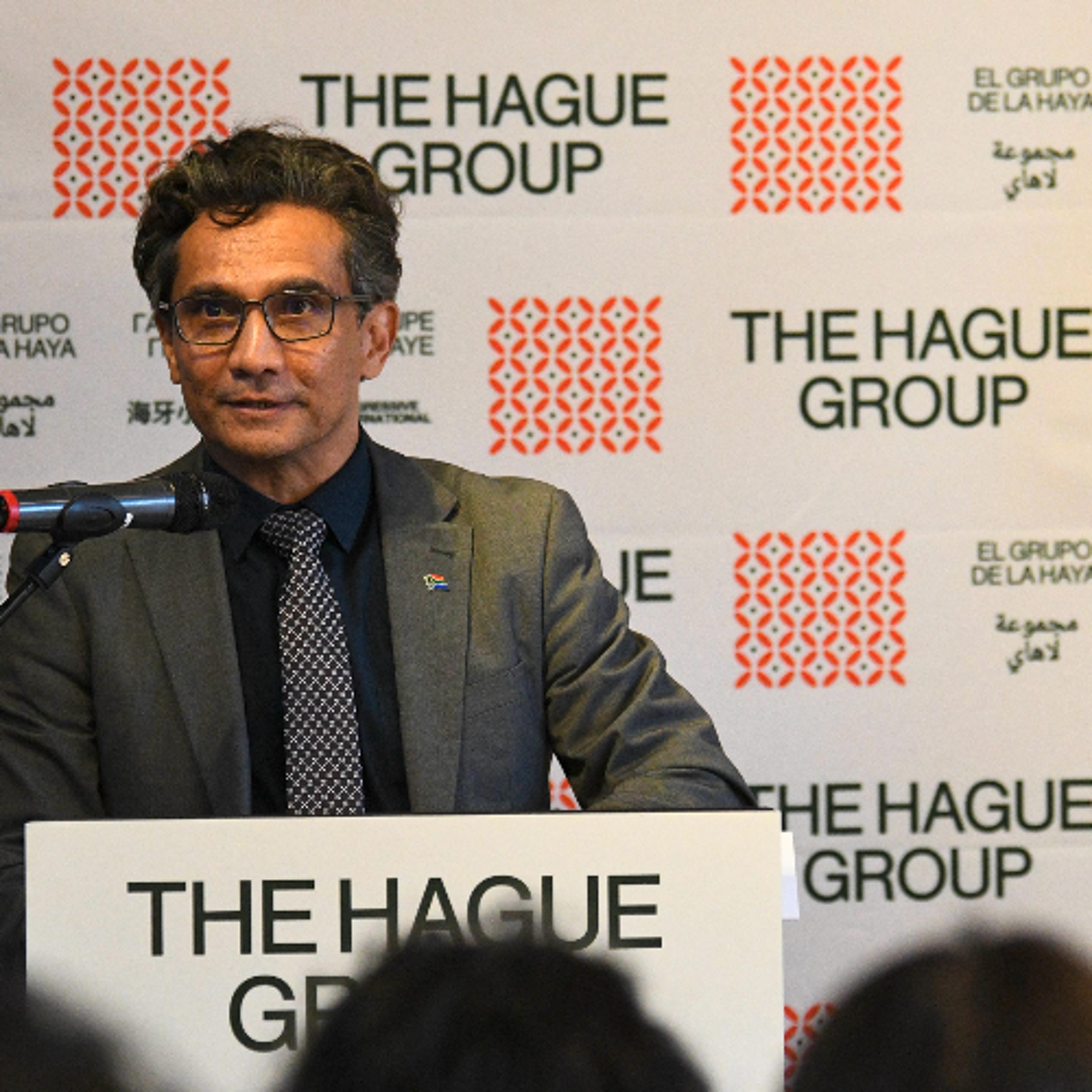 DIRCO Director-General Zane Dangor reads out the joint statement of the Hague Group of nations