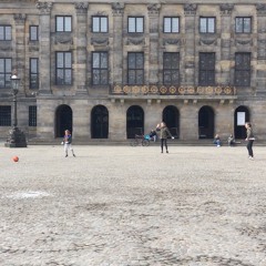 Children playing football on the Dam Square