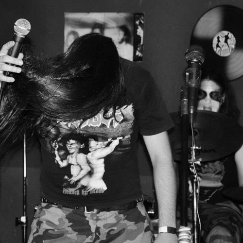 Twisted Mass of Burnt Decay/In the Grip of Winter (Autopsy Cover)